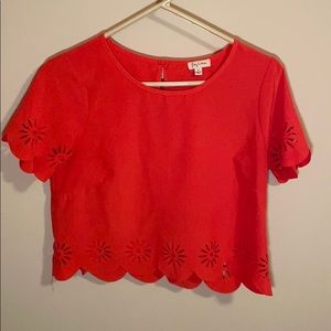 Cropped red top with scalloped edge